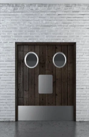 The Satin Stainless Steel Kickplate is installed on a black color door.